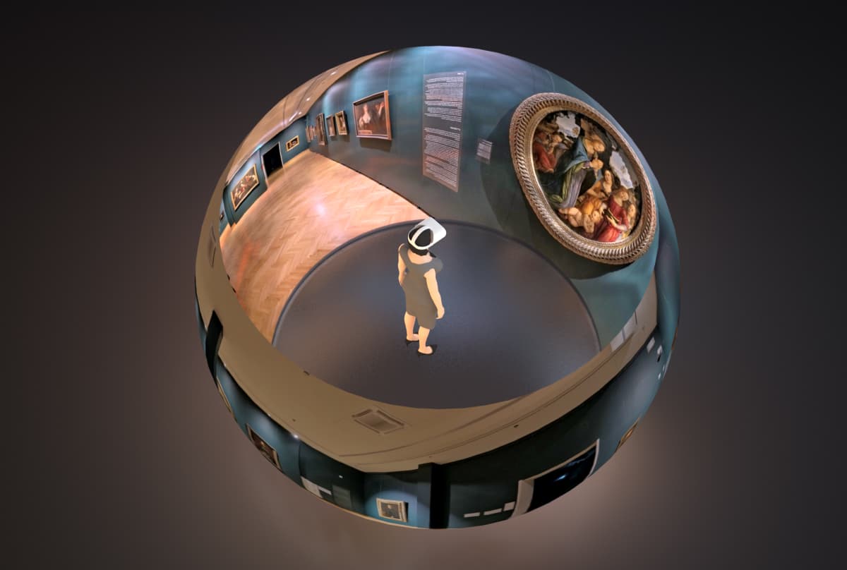 A virtual reality (VR) environment showcasing an immersive 360-degree art gallery. The focal point is a solitary figure, possibly a visitor, standing in the center and wearing a VR headset.